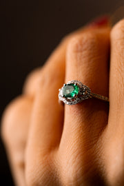 White Gold Engagement Ring with Diamonds and Green Emeralds